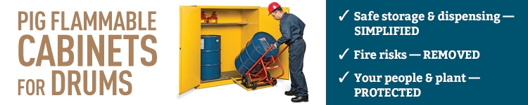 Man loading a 55 gallon drum into a yellow flammable drum cabinet using a drum truck and a ramp
